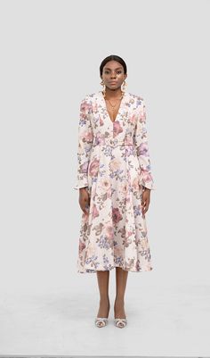 Indulge in timeless grace with our Lita Floral Belt Long Sleeve Midi Dress. This dress is a captivating blend of sophistication and style. adorned with a charming floral pattern and long sleeves that exude an air of elegance. The included belt adds a touch of versatility and enhances the figure. making it a versatile choice for various occasions.Invisible zip closurebeltFlare sleevedry cleanItem measurements have been rounded to the nearest cm.This garment fits true to sizeModel is 5'9.5"/178 cm Feminine Floral Print Fall Dress, Long Sleeve Midi Dress For Spring Garden Party, Long Sleeve Floral Dress For Brunch, Floral Print Midi Long Sleeve Dress For Brunch, Floral Print Long Sleeve Dress For Fall Garden Party, Long Sleeve Midi Dress For Garden Party In Fall, Long Sleeve Floral Midi Dress For Garden Party, Spring Long Sleeve Floral Dress For Brunch, Long Sleeve Midi Dress For Fall Garden Party