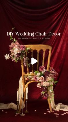 a chair with flowers and candles on it in front of a red backdrop that says, my wedding chair decor