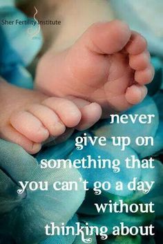 a baby's foot with the words never give up on something that you can't go a day without thinking about