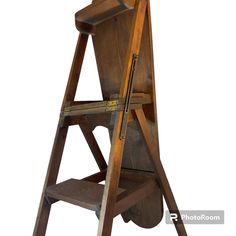 an old wooden step stool on white background