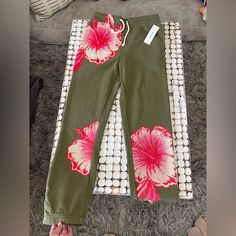 Size M- With Tags - Never Worn Joggers From Urban Outfitters Olive With Pink And White Hibiscus Flowers! Summer Floral Print Bottoms By Urban Outfitters, Green Floral Print Lounge Pants, Green Floral Print Loungewear Pants, Green Floral Print Pants For Loungewear, Urban Outfitters Pink Summer Bottoms, Urban Outfitters Pink Bottoms For Summer, Urban Outfitters Floral Print Bottoms For Spring, Urban Outfitters Pink Casual Bottoms, Casual Pink Bottoms From Urban Outfitters