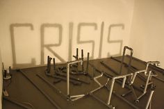 the word criss spelled out in metal pipes