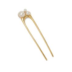 The Allison Pearl French Pin is a modern, sophisticated hair accessory that will elevate your look with understated elegance. Perfect for a bridal up-do or for a chic and polished bun, this French pin is crafted with an exquisite pearl design that is sure to turn heads. Add this timeless beauty to your collection and be ready for any occasion. Handmade in NYC. Pearl Hair Accessories, French Hair Pin, Baroque Pearl Hair Pin, Crystal Ponies, Bun Pins, Perfect Bun, Elegant Bun, Sophisticated Hairstyles, Hair Accessories Pearl