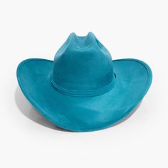 Cerulean Cowboy Hat by AB.LINO Western meets contemporary. Our take on a western classic, made from the same materials used on our flagship rancher hat. Trimmed with a Minimal Mexican Suede Hat Band. Made from stiffened Mexican suede Spot / specialist clean Brim width: 4″ / 10.16 cm Crown height: 4″ – 4.75″ Rigid crown design Please note: due to the color and nature of the suede dyeing process, some flecking or marks may be present in material Size & Fit: Our Cowboy hat is designed one-size-fits Suede Hat, Rancher Hat, Crown Heights, Crown Design, Dyeing Process, Fall Favorites, Hat Band, Fall Shopping, Cowboy Hat