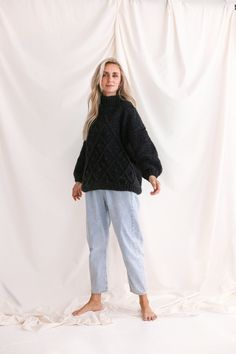 "Every woman deserves to be wrapped in love and care - and we have a sweater just for that and more. Our timeless chunky knit features the highest quality fibers to ensure warmth for the rainy evenings and soft touch for the hectic mornings. Hand-knitted by exceptional women for the comfort and elegance of those alike. DETAILS 50% Alpaca, 33% Cotton, 17% Wool. Dark Grey color. You can choose any other color listed in the last photo. Hand knitted cardigan. SIZE Available sizes Petit/XS/S/M/L/XL T Cozy Fit Chunky Knit Turtleneck Sweater, Cozy Slouchy Cable Knit Sweater, Cozy Cable Knit Acrylic Sweater, Cozy Slouchy Textured Knit Sweater, Cozy Cable Knit Top For Winter, Slouchy Cable Knit Long Sleeve Sweater, Slouchy Long Sleeve Cable Knit Sweater, Turtleneck Textured Knit Sweater For Cold Weather, Cold Weather Textured Knit Turtleneck Sweater