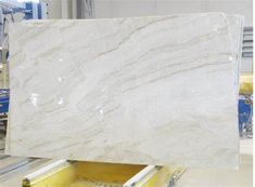 white marble is being assembled in a factory