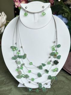 Elevate your style with our unique clip-on silver and green odd shape bead necklace! Made with high-quality silver wire, this necklace set is perfect for any occasion. Add a touch of elegance to any outfit and stand out from the crowd. Necklace 18" Ext 3" Hangs 2 1/2" in the front Earrings 1 1/4" Bead Wire, Turquoise Hoops, Wire Necklace, Weird Shapes, Necklace And Earrings Set, Necklace And Earring Set, Necklace And Earrings, Bead Necklace, Silver Wire