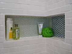 the shelves in the bathroom are filled with soaps and lotions