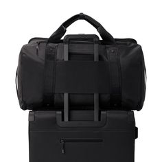 Meet our Monaco Garment Duffle Bag in black: easy to use for traveling the world, attending weddings, and maintaining the work-gym balance. Shop our 2-in-1 bag. Multifunctional Black Duffle Bag For Overnight Trips, Elegant Black Duffle Bag For On-the-go, Elegant Black Duffle Bag For Business Trips, Versatile Black Bag For Business Trips, Versatile Black Bags For Business Trips, Black Luxury Travel Accessories For On-the-go, Elegant Black Duffle Bag With Removable Pouch, Elegant Black Travel Bag, Luxury Black Travel Accessories For Overnight Trips