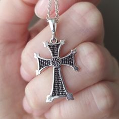 Christian cross made of sterling silver 925 with Armenian symbols of arevakhach or kerkhach which looks like a sun. The cross has a deep meaning for Armenians. Armenians were the first in the world to recognize Christianity as a state religion. Despite the fact that the cross carries Armenian symbols and meanings, it will suit all men and women who are interested in ancient symbols. The pendant cross really looks very stylish and its on sale. The fact that it is made of precious metal gives it a Traditional Silver Cross Necklace, Traditional Silver Cross Necklace As Gift, Silver Cross Pendant Necklace, Symbolic Cross Necklace As Gift, Symbolic Cross Necklace Gift, Traditional Silver Cross Necklace Gift, Silver Stamped 925 Cross Necklace For Gift, Silver Symbolic Cross Necklace As Gift, Stamped 925 Cross Necklace For Gift