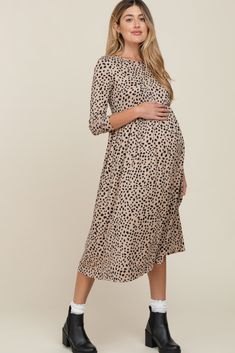 Details A printed long sleeve maternity midi dress. Content + Care 96% Polyester 4% Spandex Hand Wash Cold, No Bleach, Hang or Line Dry USA Size + Fit Length: 45" Sleeve Length: 19" Measured From: Small Product Code: 69360