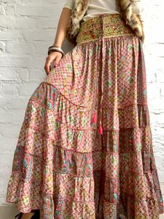 "This is gorgeous long boho style skirt perfect for ocassions, parties and everyday loose and flowy with oryginal, traditional wide banjara embroidered belt can be worn as a strapless sundress with open back also during maternity ❣️ MEAESURE elasticated waist 30-40 \" length 40\" MATERIAL *silk *poliester *no lining CARE INSTRUCTIONS * Wash in warm water * Hand wash recommended * Hang to dry IMPORTANT NOTE * Please note that colour shown on your monitor may vary from the colour of the fabric, du Bohemian Style Flowy Summer Skirt, Bohemian Style Flowy Skirt For Summer, Bohemian Skirt For Summer Festivals, Flowy Long Skirt With Boho Print, Summer Bohemian Flowy Skirt, Bohemian Summer Skirt, Bohemian Style Skirt With Boho Print For Festivals, Bohemian Skirt With Boho Print For Festivals, Bohemian Tiered Skirt For Summer