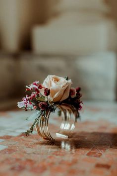 a bouquet of flowers sitting on top of a table