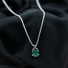 Product Details Experience a graceful radiance with the Lab Created Emerald Pendant. Embellished with a Pear Cut Lab Created Emerald in a 4 Prong Setting on a Solitaire Pendant, this Necklace exudes simplicity and elegance. A truly unique gift, this Minimalist Pendant Necklace holds a special place for you. Product Information SKU SHP-PENDANT082019801 Length 11.5 mm Width 7 mm Weight 2.08 gm (Approximate) LAB CREATED EMERALD INFORMATION No.of Stones 1 Pieces Total Weight 1.70 Carat (Approximate) Drop Emerald Necklaces For Formal Occasions, Emerald Drop Necklace For Formal Occasions, Formal Drop Emerald Necklace, Elegant Silver Drop Emerald Necklace, Drop Emerald Necklace For Formal Occasions, Formal Teardrop Necklace With May Birthstone, Formal Drop Necklace With Birthstone, Formal Teardrop Necklace For May Birthstone, Elegant Pear-shaped Emerald Necklaces