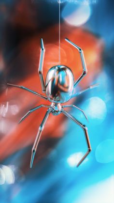 a close up of a spider on a blue and red background with blurry lights