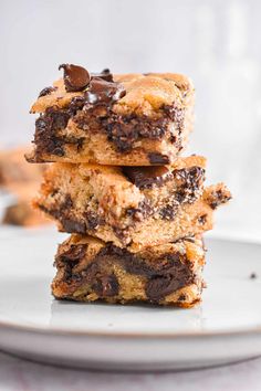 chocolate chip cookie bars stacked on top of each other