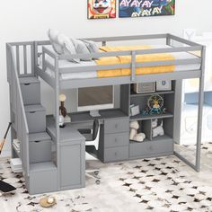 a loft bed with stairs and desk underneath it in a child's playroom