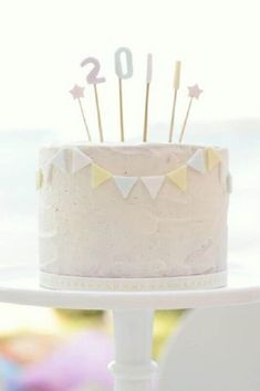 a white cake sitting on top of a table