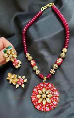 Beautiful mala/necklace set in red/ruby pink beads, moti/pearls and kundan.   Mala/necklace length approximately 10.5 inches  Earrings length approximately 2 inches Please always try to insert earrings push back gently clockwise.  It simply prevent earrings back to bend or break.   Color, shades, texture displayed may slightly vary from the actual product due to digital image limitations. Care: It is advisable that you keep our products away from direct heat, humidity, and moisture.  Please do n Festive Kundan Necklace For Diwali, Festive Chandbali Kundan Necklace Gift, Festive Round Kundan Necklace For Diwali, Pink Meenakari Temple Necklace Gift, Kundan Beaded Necklaces For Festivals, Festival Kundan Beaded Necklaces As Gifts, Kundan Pearl Necklace With Round Beads Gift, Kundan Chandbali Pearl Necklace For Gift, Round Kundan Necklace With Meenakari As Gift