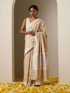 Khinkhwab brings to you this gorgeous ensemble that has been crafted in pure silk. This moonga saree is quite a statement piece and is a part of Khinkhwab's exclusive Tissue Silk collection. Chanderi Meenakari Pre-draped Saree For Navratri, Meenakari Raw Silk Pre-draped Saree For Wedding, Navratri Meenakari Tussar Silk Pre-draped Saree, Pre-draped Tussar Silk Saree With Meenakari For Festivals, Eid Tussar Silk Pre-draped Saree In Traditional Drape, Eid Tussar Silk Traditional Drape Pre-draped Saree, Eid Tussar Silk Pre-draped Saree, Eid Traditional Drape Pre-draped Tussar Silk Saree, Slub Silk Pre-draped Saree For Eid Puja