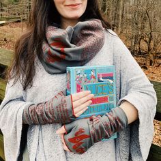 Beware the Jabberwock, my son! The jaws that bite, the claws that catch! Our Limited Edition Jabberwocky Book Scarf features the entire poem by Lewis Carroll from Through the Looking Glass. Text and images wrap around both sides of this infinity-style scarf made from soft cotton knit and screen-printed with red ink. Equal parts eerie and nonsensical, Jabberwocky is the most frabjous way to celebrate the spooky season. Product details: Super soft 100% cotton jersey knit for continuous comfort War Book Scarf, Infinity Design, Style Scarf, The Claw, Lewis Carroll, Through The Looking Glass, Red Ink, Cotton Knit, Scarf Styles