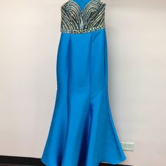 Blue Dress With Sequins And Beading In Nude, Black, Silver, Blue And Iridescent (Meaning They Go With Any Shoe!!) , Fit And Flare Style Satin Material, Super Flattering! Embellished Blue Mermaid Prom Dress, Blue Embellished Fitted Mermaid Dress, Blue Embellished Sleeveless Mermaid Dress, Sleeveless Embellished Blue Mermaid Dress, Blue Embellished Dress For Prom Season, Embellished Blue Dresses For Prom Season, Blue Embellished Evening Dress For Homecoming, Blue Embellished Homecoming Dress, Dress With Scarf