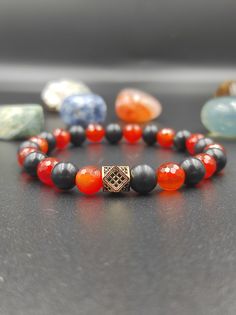 We designed by using the unique natural Shungite stone, Hematite stone and Carnelian stone together. Shungite stones and Carnelian in the handmade bracelet are 8 mm. We guarantee that all our gemstones are of the highest quality and 100% genuine. You can find our other jewelry made with Shungite stone in our store. Our store also has handmade eyeglass chains, necklaces, bracelets.  You can visit our store for all handmade jewelry.   Instagram Profile : @lightcropjewelry Black Carnelian Jewelry For Gifts, Hematite Beaded Bracelets With Natural Stones As Gift, Handmade Onyx Beaded Bracelet As Gift, Hematite Bracelets With Natural Stones For Gift, Spiritual Onyx Beaded Bracelets Gift, Handmade Black Carnelian Jewelry, Black Agate Bracelets As Gift, Black Agate Beaded Bracelet Gift, Handmade Black Agate Bracelets