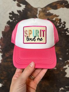 a pink and white trucker hat with the words spirit lead me written on it