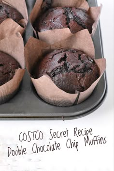 Chocolate muffin in muffin liner sitting in muffin tin. Smitten Kitchen Double Chocolate Chip Muffins, Sams Club Chocolate Chip Muffins, Muffin Recipes Double Chocolate Chip, Chocolate Muffins Costco, The Best Chocolate Muffins, Best Double Chocolate Muffins, Costco Double Chocolate Chip Muffins, Costco Chocolate Muffins Copycat, Sams Club Muffin Recipe