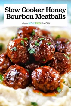 slow cooker honey bourbon meatballs on top of mashed potatoes with garnish