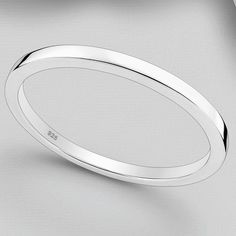 925 Sterling Silver Bangle Diameter: 64 mm Width: 6 mm Weight: 22.8 grams Minimalist Sterling Silver Bangle With Shiny Finish, Sterling Silver Bangle With Shiny Finish For Anniversary, Classic Hoop Bangle As Gift, Classic Hoop Bangle Gift, Classic Hoop Bangle For Gift, Classic Stackable Sterling Silver Bracelet, Minimalist Sterling Silver Anniversary Bracelet, Minimalist Sterling Silver Round Bracelet For Anniversary, Classic Sterling Silver Stackable Bracelet