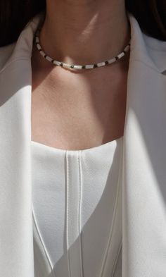 This vanilla girl dainty choker exudes understated elegance with its combination of natural mother-of-pearl and malachite beads. Crafted with care and attention to detail, this choker is a versatile accessory that can effortlessly elevate any outfit, whether it's worn alone for a minimalist look or layered with other necklaces for added impact. 🎁  This dainty choker makes an ideal gift for those who appreciate earthy jewelry and minimalist aesthetics. Its delicate design and soothing color pale Handmade Elegant Malachite Beaded Necklaces, Adjustable Beaded Malachite Necklace, Elegant Green Malachite Necklace, Luxury Handmade Malachite Necklace, Elegant Malachite Pendant Necklace, Delicate Choker, Malachite Earrings, Malachite Necklace, Earthy Jewelry