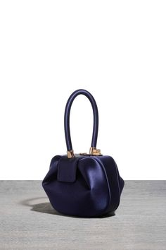 Nina Bag by Gabriela Hearst Charles And Keith Bags, Round Pouch, Structured Top, Latest Handbags, Chanel Jumbo, Gabriela Hearst, Satin Bags, Travel Handbags, Shoe Bags