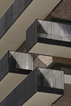 two balconies on the side of an apartment building