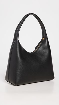 Find MANSUR GAVRIEL Soft Candy Bag on Editorialist. This Mansur Gavriel shoulder bag is crafted from pebbled cowhide leather with gold-tone hardware. It features a zip closure, a slip interior pocket, and a suede lining. The bag measures 7.25 inches in height, 9.75 inches in length, and 4.25 inches in depth. The handle drop is 7 inches. It weighs 17 ounces. Made in Italy. Soft Candy, Mansur Gavriel, Candy Bags, In Depth, Cowhide Leather, Dream Wardrobe, Leather Shoulder Bag, The Bag, In Italy