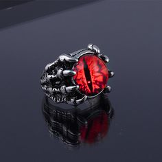 Why Eye Of Sauron Ring Is Necessary? The Best Eye of Sauron Ring is a reminder of the power of Sauron and the dark lord's influence over Middle-earth. It is also a physical representation of Sauron's all-seeing gaze, which is said to be able to penetrate even the strongest defenses. Sauron jewelry is that they are designed to protect the wearer from evil and ward off the evil that has been directed at them. Wearing any piece of jewelry with the Sauron symbol on it provides the wearer with both p Dsmp Rings, Evil Eye Rings, Eye Rings, Man Bars, Monster Eyes, Red Ring, Claw Ring, Woman Personality, Fashion Creative