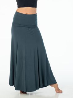 Fully convertible, this full-length maxi skirt features a wide fold-over waistband and hourglass silhouette. Made from our mid-weight rayon jersey, it’s designed to be worn as a skirt or strapless dress. [#details] Can be worn 2 ways: Strapless maxi dress Maxi Skirt Size Suggestions S/M: 2-6 M/L: 8-12 [/details] [#fabric] Rayon Lycra: 90% Rayon (Viscose) / 10% Spandex (Lycra) [/fabric] Non-stretch Flared Maxi Skirt With Pockets, Cotton Stretch Wide-leg Maxi Skirt, Stretch Full-length Versatile Maxi Skirt, Non-stretch Blue Maxi Skirt, Non-stretch Blue Lined Maxi Skirt, Convertible Skirt, Hourglass Silhouette, Lycra Fabric, Jersey Skirt