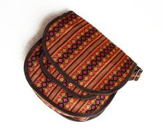 Brand New and recently handmade embroidered hippie crossbody bag. This Ethnic embroidered bag is very unique. This beautifully handmade crossbody bag has a strap which is approx 36 inches long and add comfort and ease to carry around.  The strap may be used as a shoulder bag or a crossbody messenger bag because it is adjustable. Bohemian Saddle Bag With Adjustable Strap, Traditional Handwoven Crossbody Shoulder Bag, Bohemian Handmade Saddle Bag For Travel, Handmade Bohemian Saddle Shoulder Bag, Traditional Brown Bag With Weaving Work, Traditional Shoulder Bag With Multicolor Embroidery And Adjustable Strap, Traditional Bag With Multicolor Embroidery And Adjustable Strap, Traditional Multicolor Crossbody Satchel, Traditional Brown Saddle Bag For Travel