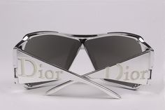 Vintage 2000's sunglasses CHRISTIAN DIOR, made in Italy, model Overshine 1, silver color. Frame with personality with high quality materials. Excellent condition with wear on the frame, and some scratches on the lenses, see pictures. Delivered with original Dior case. Ref: OB1052 CONDITION: Excellent DIMENSIONS: Lens width: 70 mm Lens height: 65 mm Frame width: 140 mm Temple length: 110 mm Engraved on the temple: OVERSHINE 1 N6JSF 110 More vintage items in my online shop: http://www.vintagecarwe Silver Sunglasses With Uv Protection For Streetwear, Luxury Silver Shield Sunglasses With Polarized Lenses, Luxury Silver Sunglasses With Uv Protection, Trendy Silver Shield Sunglasses With Polarized Lenses, Designer Silver Sunglasses With Uv Protection, Silver Sunglasses For Summer Streetwear, Trendy Silver Anti-reflective Shield Sunglasses, Luxury Silver Shield Sunglasses With Gradient Lenses, Modern Silver Sunglasses With Uva Protection