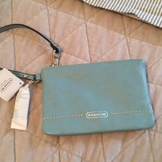 Pretty Tiffany Blue Coach Wristlet Fits An Iphone 6s Blue Bags With Wrist Strap For Daily Use, Blue Coach Pouch Wristlet, Coach Blue Pouch Wristlet, Blue Coach Wristlet For Daily Use, Coach Blue Wristlet For Travel, Coach Blue Wristlet For Daily Use, Blue Rectangular Bag With Wrist Strap, Coach Bags With Wrist Strap And Rectangular Shape, Blue Rectangular Wristlet With Removable Pouch