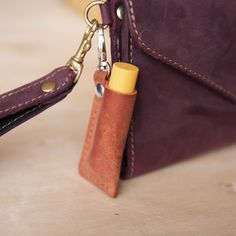 These are the cutest Leather Chapstick, Lip balm Keychain Cases. They are made from full-grain leather and come with a swivel hook to easily attach it to whatever suits you, so it doesn't get lost. They are made to hold your standard round chapstick containers measuring 2.8 x 0.7 x 3.8 inches. These Leather Lip Balm cases are handcrafted by our family, as well as everything we carry in our shop. It is local, handcrafted, and made with heart. The Leather Lip Balm Keychain thoughtful, unique gift Leather Lip Balm Holder Diy, Small Leatherwork Projects, Quick Leather Projects, Unique Leather Products, Beginner Leather Projects Ideas, Small Leather Gifts, Small Leather Crafts, Scrap Leather Projects Diy, Leather Scraps Ideas