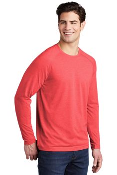 This ultracomfortable tee combines moisture-wicking performance, unbeatable tri-blend softness and PosiCharge technology to lock in color.; 4.4-ounce, 75/13/12 poly/cotton/rayon jersey with PosiCharge technology; 4.6-ounce, 75/13/12 poly/cotton/rayon jersey with PosiCharge technology (Black Triad Solid); 4.7-ounce, 75/13/12 poly/cotton/rayon jersey with PosiCharge technology (White Triad Solid); Removable tag for comfort and relabeling; Dyed-to-match neck taping; Raglan sleeves University Red Long Sleeve Top, Casual University Red Moisture-wicking Tops, Red Long Sleeve Sports Top, Red Stretch Long Sleeve Shirt, University Red Moisture-wicking Crew Neck Top, Breathable Red T-shirt For Sports, Cheap Red Raglan Sleeve T-shirt, Red Moisture-wicking Crew Neck Top, Sporty Stretch Raglan Sleeve T-shirt