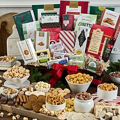 a table filled with lots of different types of snacks and treats on it's side