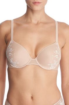 Elegant floral embroidery romances the stretch-foam cups of an everyday contour bra that creates a smooth, lifted look under outfits. 53% nylon, 24% polyester, 23% elastane Hand wash, line dry Imported Elegant Padded Beige Bra, Elegant Beige Seamless Bra, Beige Underwire Bra With Moderate Coverage, Elegant Padded Bra, Feminine Beige Bra With Medium Bust Support, Feminine Cream Bra With Padded Cups, Spring Full Coverage Padded Bra, Elegant Cream Bra With Medium Bust Support, Beige Full Coverage Bra For Spring