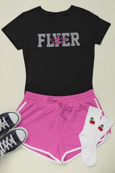 Flyer Cheer Shirt. This Design can be placed on any shirt that we carry. If you would like it on a different style shirt please contact us. Youth Sizes Youth XSmall - Youth XLarge. Please include the following information in message to sender box. Also keep in mind that this design comes in 2 colors as shown. Available in Glitter Vinyl or Regular Print. 1. Color 1 - Word Flyer 2. Color 2 - Cheerleader For Example: 1. Color 1 - Word Flyer = Silver Glitter 2. Color 2 - Cheerleader = Pink Glitter F Black Tops For Summer Cheerleading, School Spirit Tops For Summer Cheerleading, Summer Cheerleading Tops With School Spirit Style, Summer School Spirit Tops For Cheerleading, Black Tops For Cheerleading In Summer, Black Cheerleading Tops For Summer, Black Summer Tops With School Spirit Style, Black Summer Tops With School Spirit, Pink Sporty T-shirt For Cheerleading