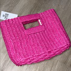 Leave Worries And Excess Baggage Behind With The Coastal Days Purse. Perfect For Packing Just The Essentials, The Small Straw Bag Features A Structured Shape With Wrapped Handles. Features: Small Straw Purse. Square Shape. Wrapped Straw Handles. 2.8 Liter Capacity. Dimensions: 8 X 12 Inches. Pink Woven Bags For Beach Season, Pink Rectangular Straw Bag For Beach, Rectangular Pink Straw Bag For Vacation, Rectangular Beach Bag As Spring Gift, Trendy Pink Rectangular Straw Bag, Pink Rectangular Straw Bag For Spring, Pink Satchel Beach Bag, Pink Rectangular Beach Bag With Braided Handles, Pink Woven Rectangular Straw Bag