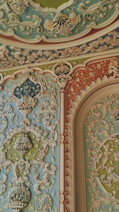 an ornately painted wall in a building