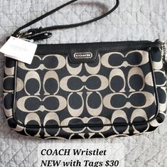 New Coach Wristlet. Black Travel Wristlet With Wrist Strap, Black Wristlet With Wrist Strap For Travel, Black Coach Wristlet For Travel, Chic Black Coach Wristlet, Coach Black Wristlet For Evening, Coach Black Evening Wristlet, Black Coach Wristlet For Evening, Black Handheld Wristlet For Travel, Coach Clutch