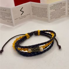 Immerse Yourself In The Ancient World Of The Vikings With Our Unique, Handcrafted Bracelet Adorned With Viking Runes. Each Piece Is A Work Of Art, Meticulously Crafted By Hand, Combining Threads, Leather, Wood, And More To Create A Stunning Accessory That Tells A Story. *Unique Pieces:* No Two Bracelets Are Alike, Making Each One Truly Special. *Handmade:* Expertly Crafted By Artisans Using Traditional Techniques. *Material Fusion:* A Beautiful Blend Of Threads, Leather, Wood, And Other Natural Viking Rune Bracelet, Rune Bracelets, Layered Cross Necklace, Hanging Necklaces, Vintage Dragon, Black Wedding Rings, The Vikings, Ancient World, Punk Vintage