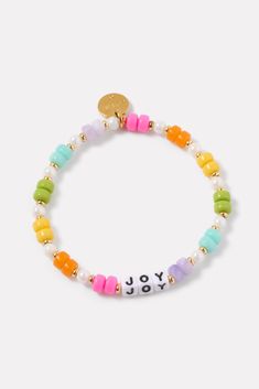 A wearable reminder of words to live by, this beaded bracelet by Little Words Project is handcrafted with “Joy” lettering, multi-color beads, and stretch elastic for easy on-and-off. Alone or stacked, it makes the perfect gift for yourself or a friend. Little Words Project encourages you to wear your word to lift you up, and then pass it on to someone who needs it more. Each bracelet comes with a unique ID tag. Use this code to register your bracelet on the Little Words Project website to join the community and track your bracelet’s journey from person to person. Word Bracelet Beads Ideas, Letter Bracelet Beads Ideas, Little Words Project Bracelets, Letter Bracelet Beads, Joy Lettering, Joy Letters, Beaded Name Bracelet, Project Website, Little Words Project